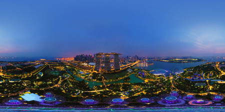 360 panorama by 180 degrees angle seamless panorama view of aerial view of Singapore Downtown. Financial district in technology smart urban city in Asia. Skyscraper buildings at night.のeditorial素材