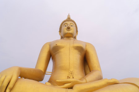 The Giant Golden Buddha in Wat Muang in Ang Thong district near Bangkok. Urban town city, Thailand.の写真素材