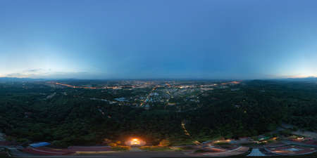 360 panorama by 180 degrees angle seamless panorama of aerial view of roofs of local village houses. Residential buildings at night in Nan, Thailand. Urban city town in Asia. Architecture landscape.の写真素材