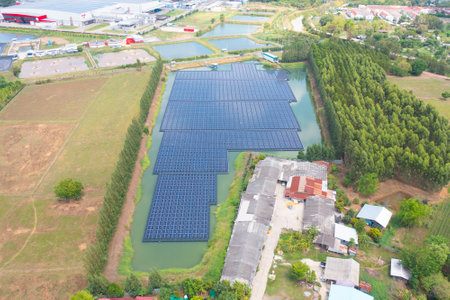 Aerial view of solar panels or solar cells on water in lake river . Power plant, renewable clean...