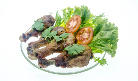 Grilled chicken isolated white backgroundの写真素材