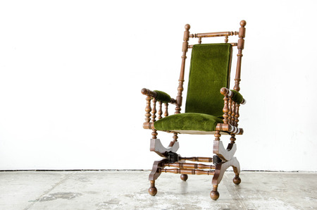 Classical style rocking chair with green wool on white backgroundの写真素材
