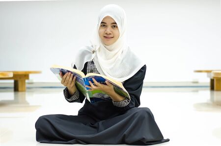 Portrait of Muslim in the library