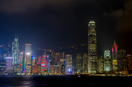 HONG KONG - NOVEMBER 15, 2016: Hong Kong skyline of Hong Kong Island with city lights viewed from Tsim Tsa Tsui waterfront across Victoria Harbor.のeditorial素材
