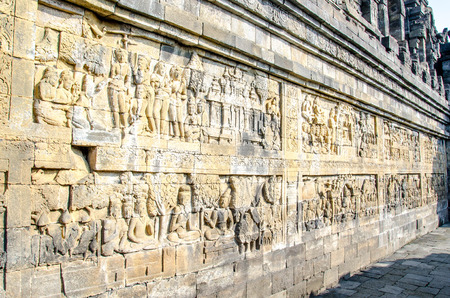 Decorated stone with bas reliefs in the Borobudur temple in Yogyakarta, Java, Indonesia. のeditorial素材