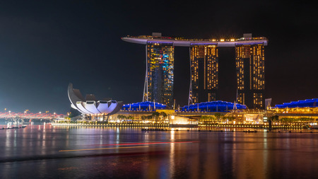 SINGAPORE, DECEMBER 22 2017 : Cityscape of Singapore skyline at twilight time. Marina Bay is a bay located in the Central Area of Singapore.のeditorial素材