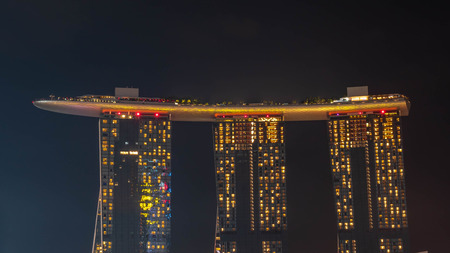 SINGAPORE, DECEMBER 22 2017 : Cityscape of Singapore skyline at twilight time. Marina Bay is a bay located in the Central Area of Singapore.のeditorial素材