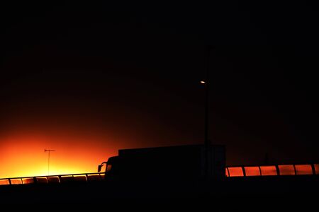 Silhouette of a transport truckの写真素材