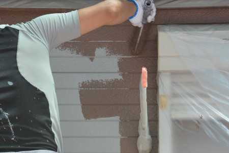Painting house walls and roofの写真素材
