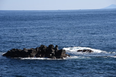 Seashore landscape white waves and Izu peninsula, Shizuoka Prefecture Jpan.の写真素材