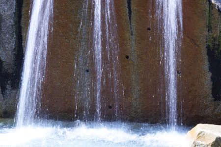 Natural modeling of water. A view of the fountain in the park.