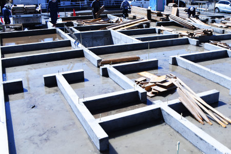 A view of the foundation construction site of a residential building. Finishing foundation work.