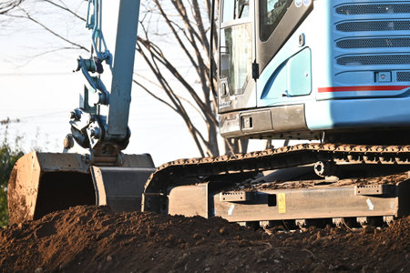 Scene of road construction by Hydraulic excavator. Background material for construction machinery.