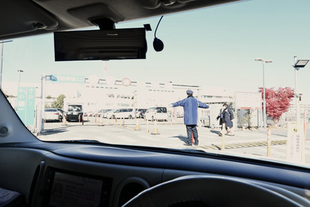 A scene of a paid parking lot for cars in Japan. The parking lot's automatic gate system.の写真素材