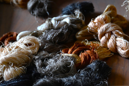 Japanese traditional crafts. Tsumugi (Pongee) weaving. Tsumugi is a silk fabric woven with pongee...