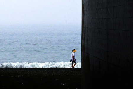 Beach scene. Natural landscape background material. The sound of the sea breeze and waves is the music of nature that soothes the soul.の写真素材