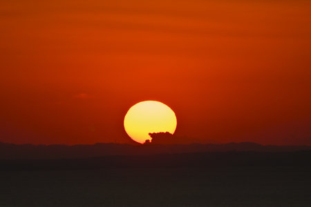 A fantastic moment of morning glow and sunrise. Natural beauty background material.の写真素材