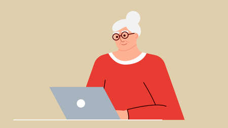 Senior woman studies and studies modern technologies using a laptop. A positive smiling grandmother sits at a computer, communicates on the Internet online and learns new things. An adult is working.のイラスト素材