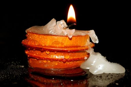  burning old candle whith small dropsの写真素材
