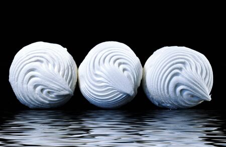 Three sweet zephyrs on a black backgroundの写真素材