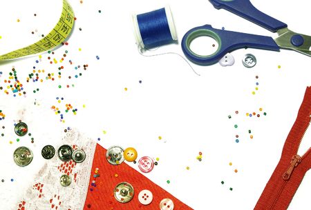 Red fabric, buttons and colorful beads as background