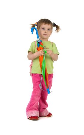 Beautiful little girl and her closed umbrellaの写真素材