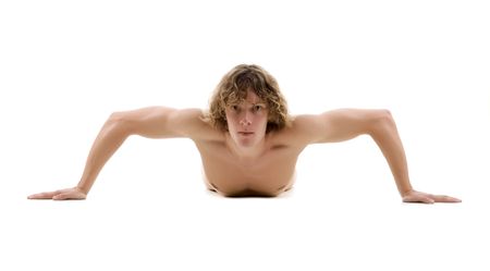 Pretty nude man on the floor. White backgroundの写真素材