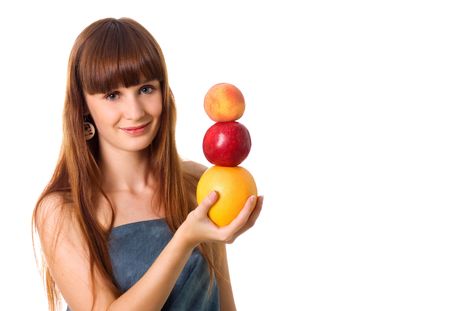 Pretty woman hold some fruits. Studio shotの写真素材