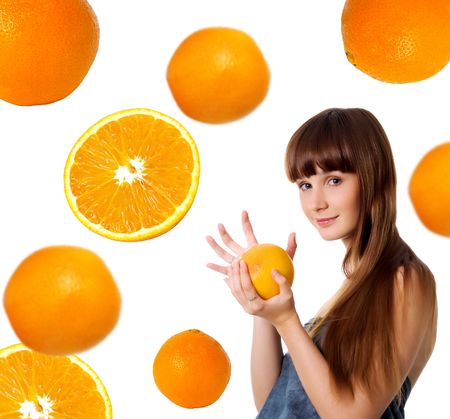 Happy young woman with grapefruit. Studio shotの写真素材