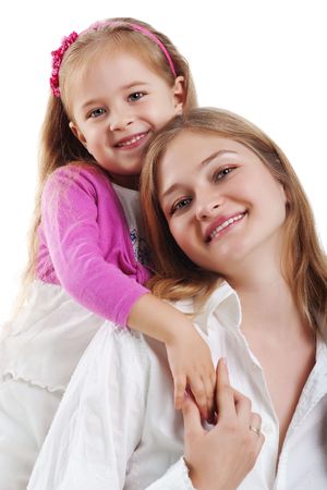Cute little girl and her mother. Studio shotの写真素材