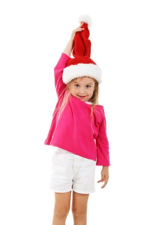Cute little girl in a santa claus hatの写真素材