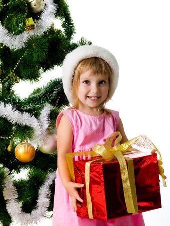 Cute girl with xmas gifts. Isolated on witeの写真素材