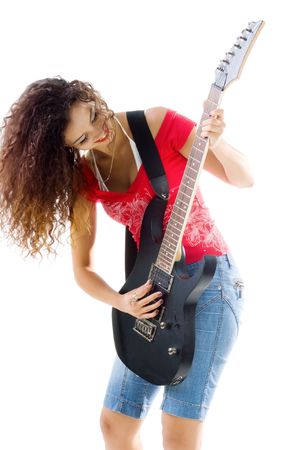 Pretty women with electric guitar. Studio isolatedの写真素材