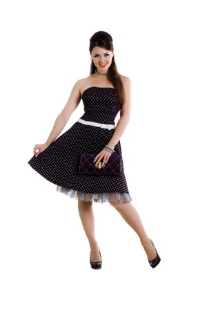 Beautyful girl in retro dress on a black backgroundの写真素材
