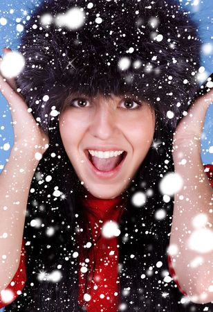 Winter pretty women isolated on a blue  backgroundの写真素材
