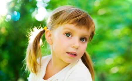 Portrait of a happy liitle girl close-upの写真素材