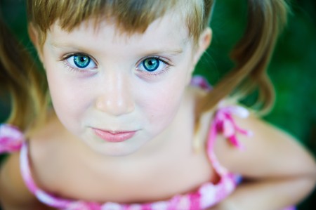 Portrait of a sad liitle girl close-upの写真素材