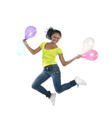 Beautiful african girl jump isolated on white backgroundの写真素材