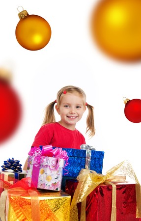 Cute girl with a xmas gift. Isolated on witeの写真素材
