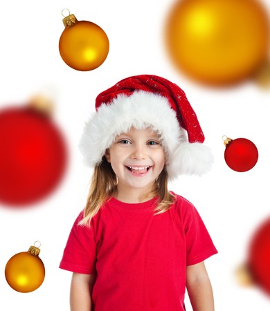 Cute little girl in the santa claus hat. Isolated on witeの写真素材