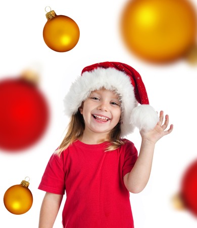 Cute little girl in the santa claus hatの写真素材