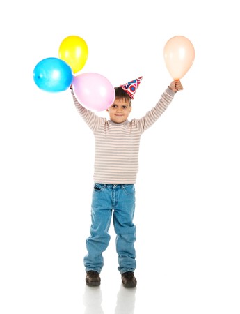Funny boy in birthday cap isolated on whiteの写真素材