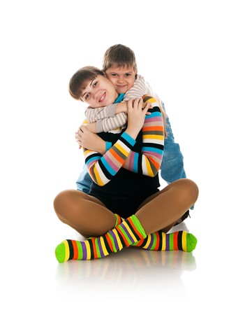 Smiling people. Mother and her son. Studio isolatedの写真素材