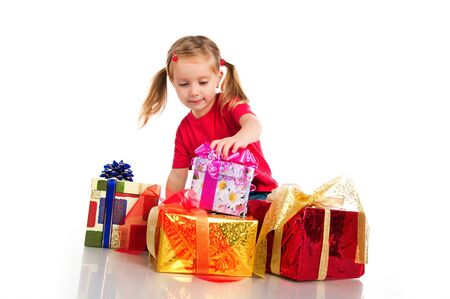 Four years old girl wih the presentsの写真素材