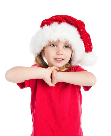Cute little girl in the santa claus hatの写真素材