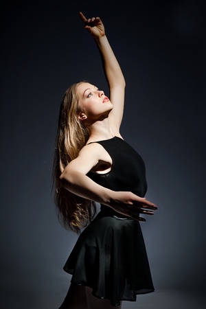 a young wonderful ballerina is dancing gracefully の写真素材