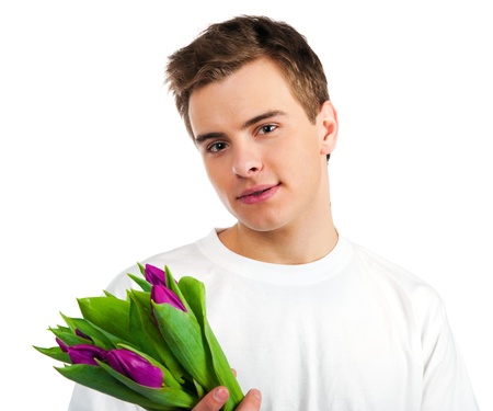 Cute young men give the flowers over white backgroungの写真素材