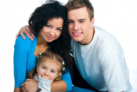 Happy family isolated on a white backgroundの写真素材
