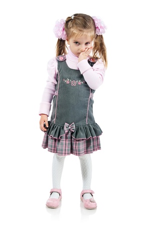 Cry little girl. Studio shot. White background.の写真素材
