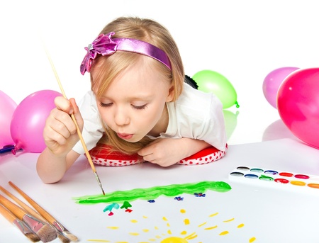 Adorable little girl drawing artworkの写真素材